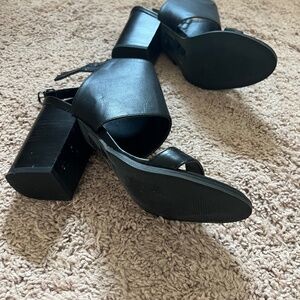 Woman’s high heeled strappy sandals